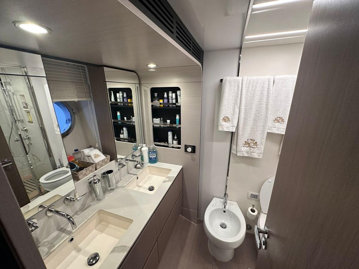 a bathroom with a sink and a toilet aboard BLUE Yacht for Sale