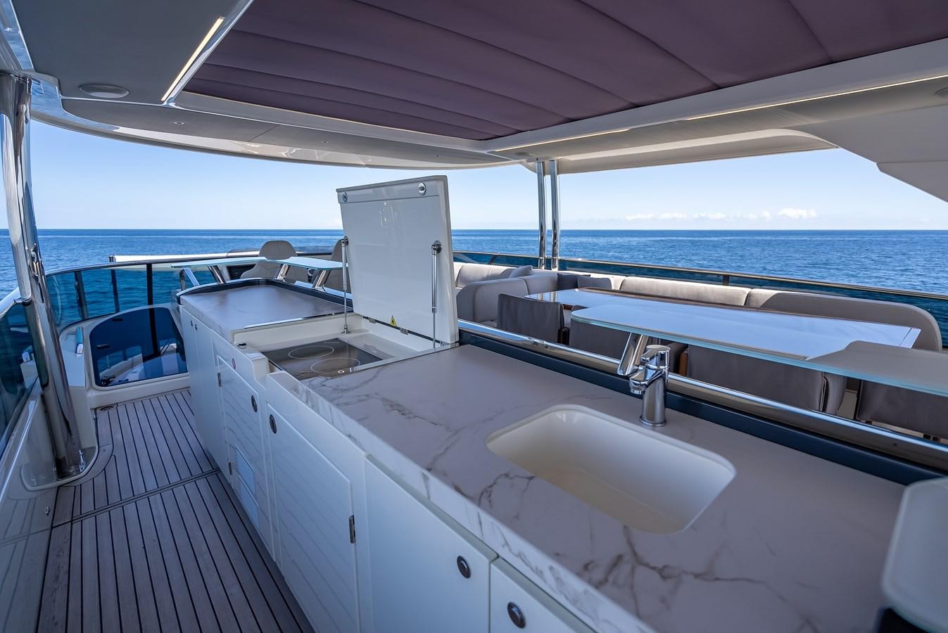 a boat with a sink and a large window aboard AQUARIUS Yacht for Sale