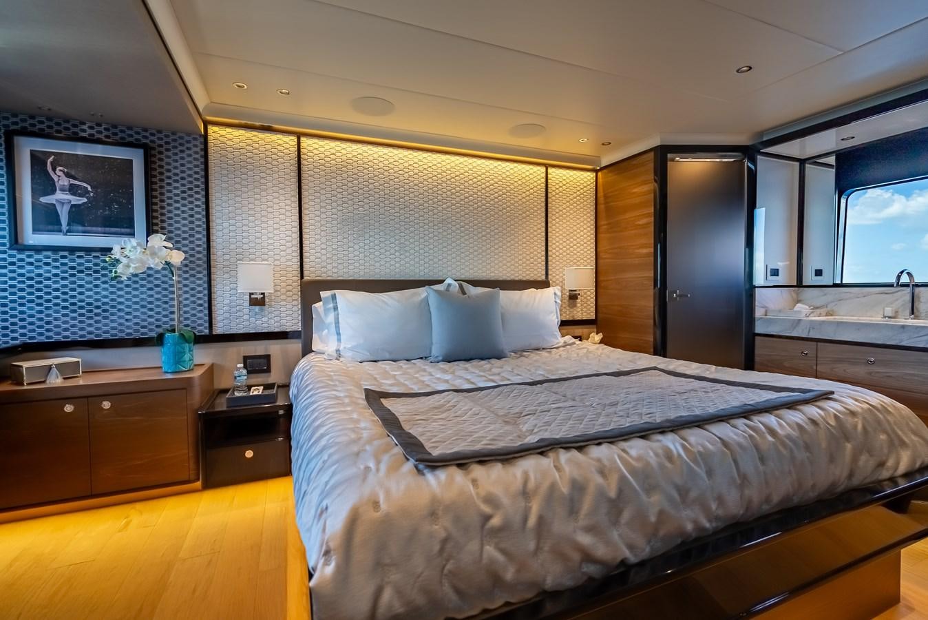 a bed in a room aboard AQUARIUS Yacht for Sale