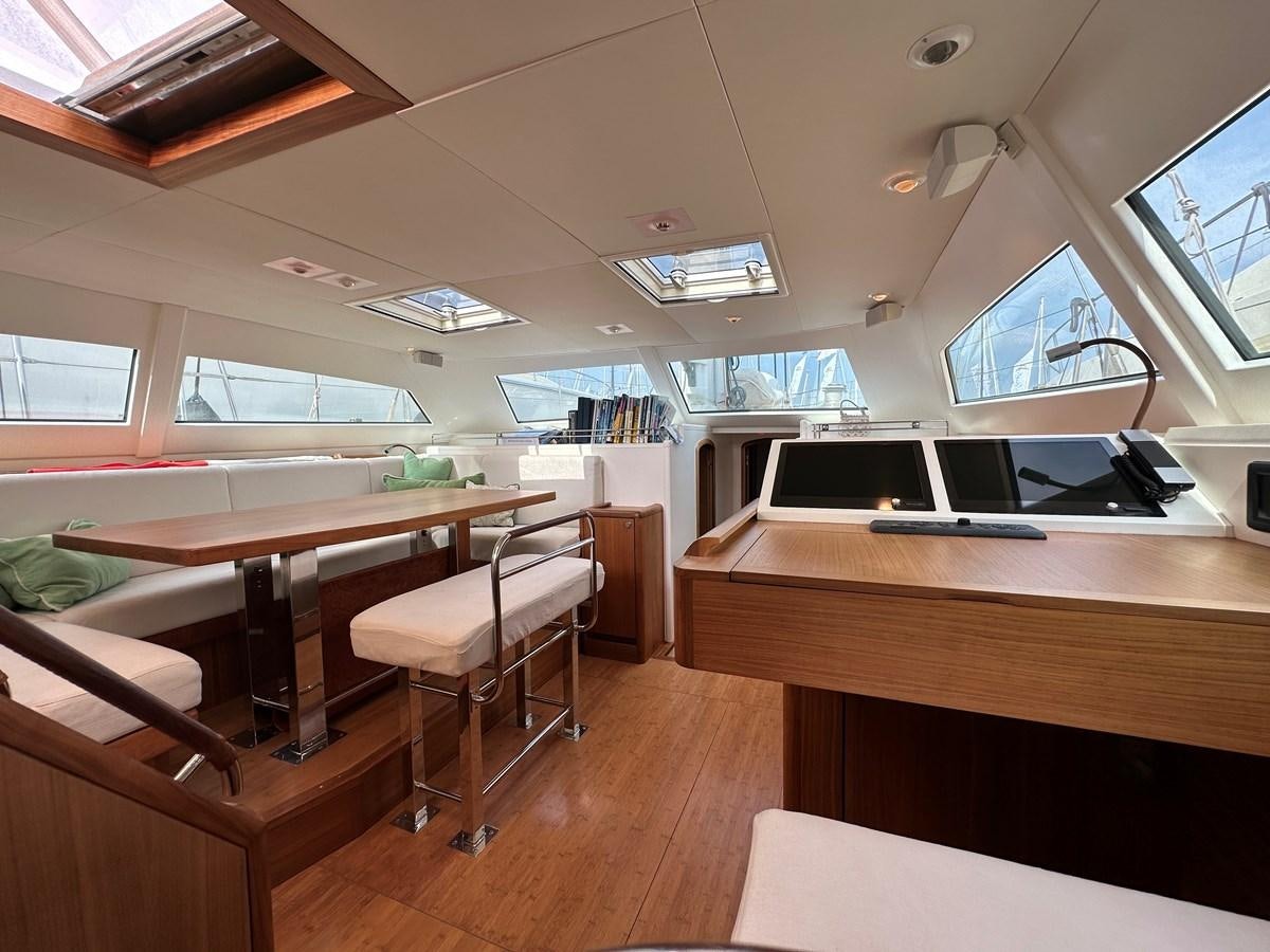 a room with a desk and a computer aboard REGINA Yacht for Sale