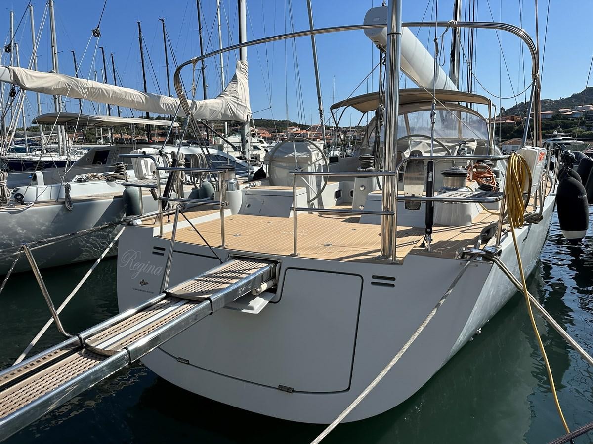 a boat docked at a pier aboard REGINA Yacht for Sale