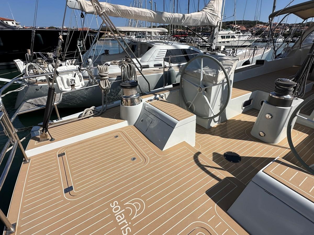 a boat with a large engine aboard REGINA Yacht for Sale
