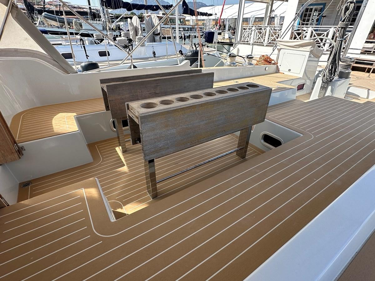 a large room with a bench aboard REGINA Yacht for Sale