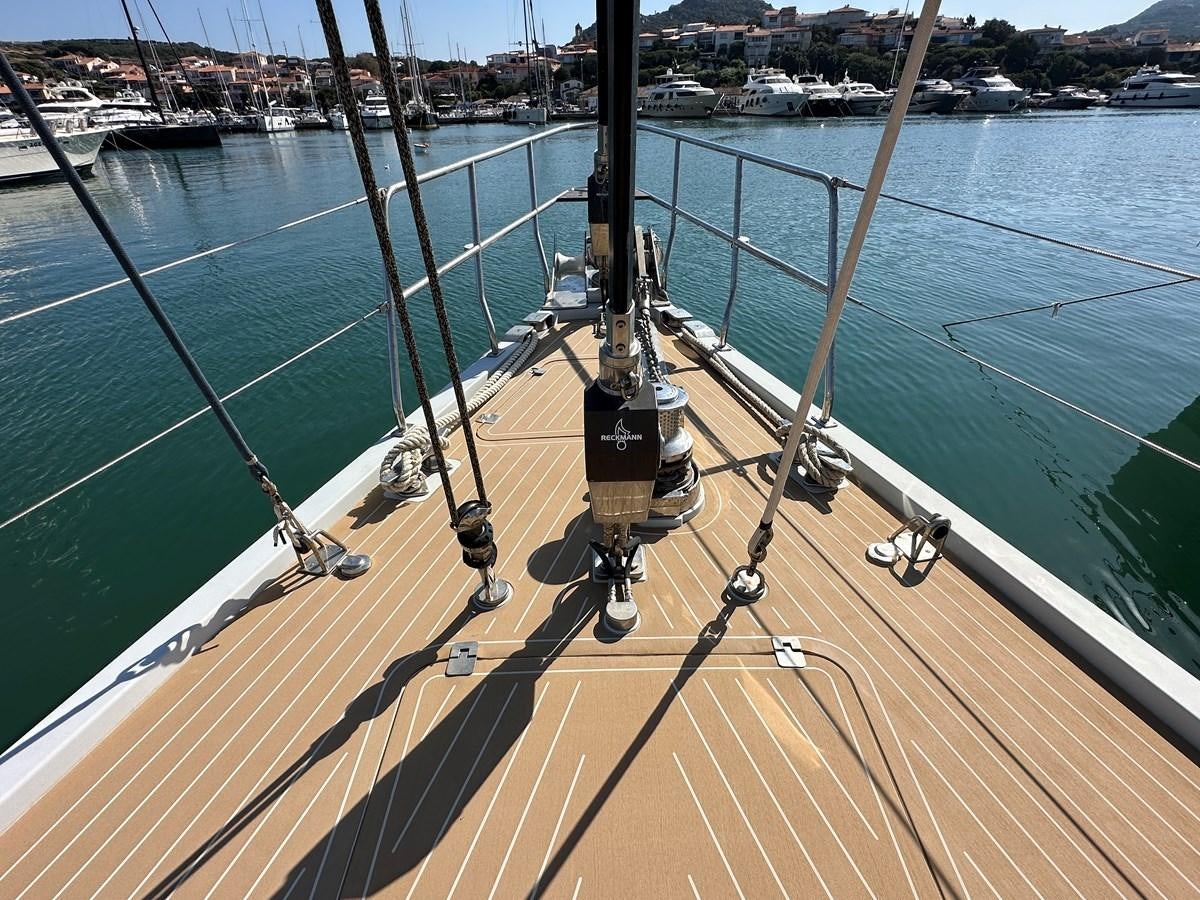 a large ship in the water aboard REGINA Yacht for Sale