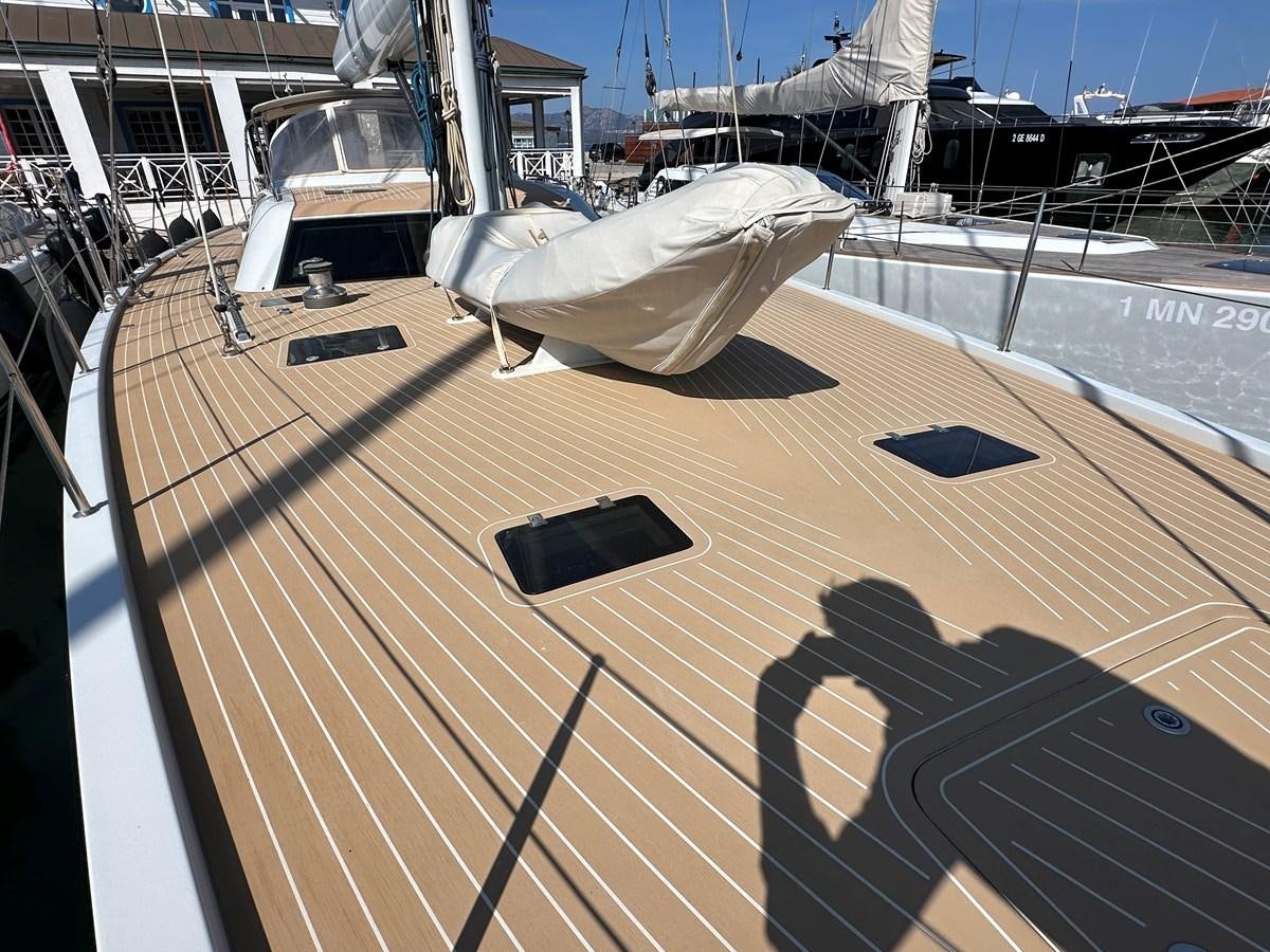 a deck with a boat on it aboard REGINA Yacht for Sale