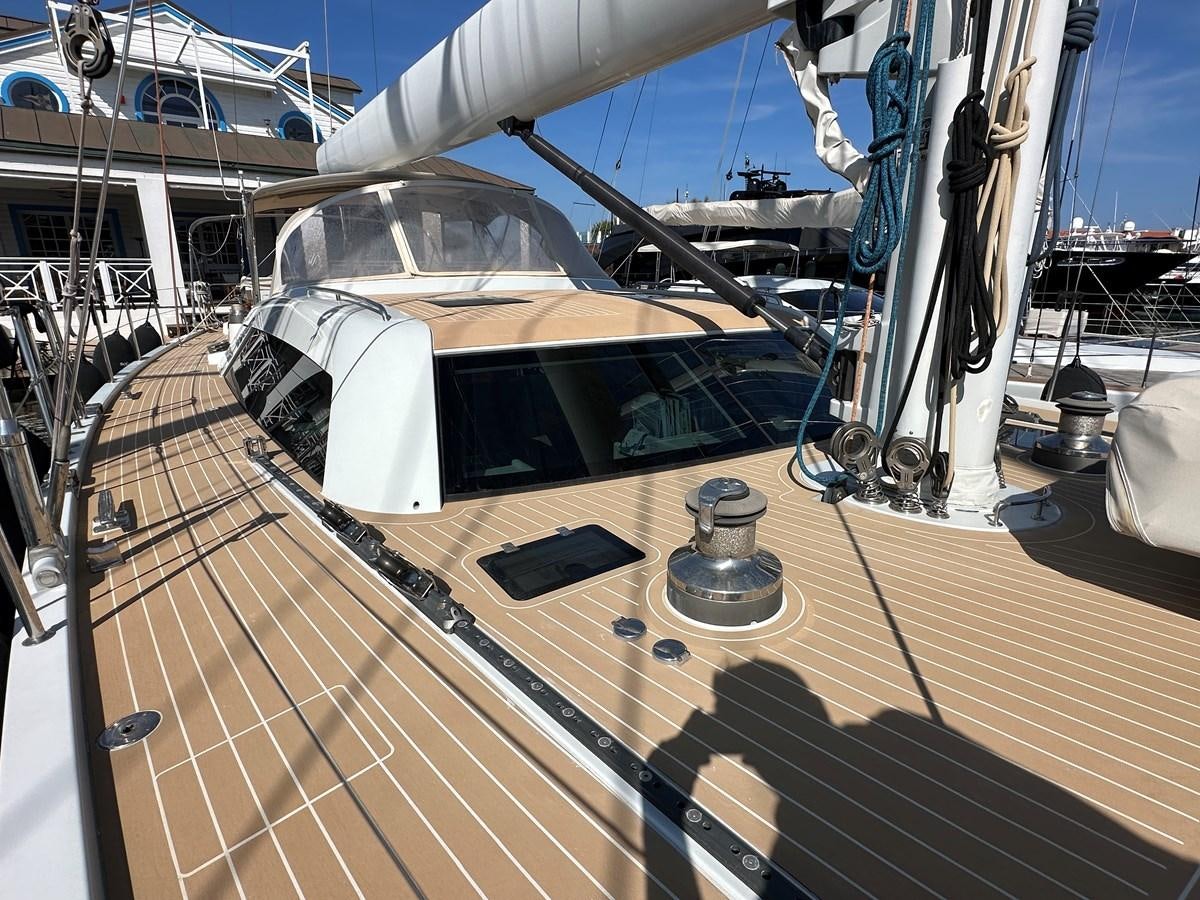 a boat on a deck aboard REGINA Yacht for Sale