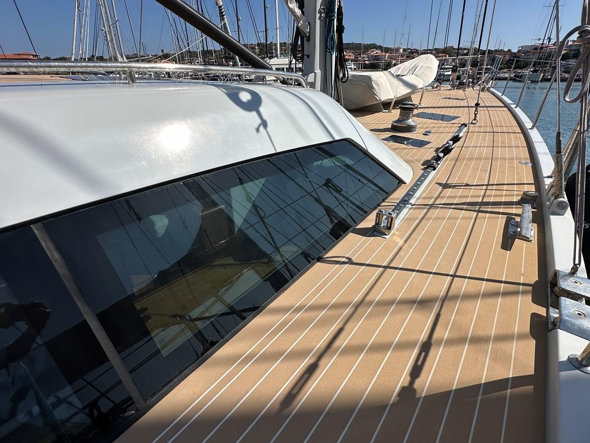 a large metal ship with a satellite dish on it aboard REGINA Yacht for Sale