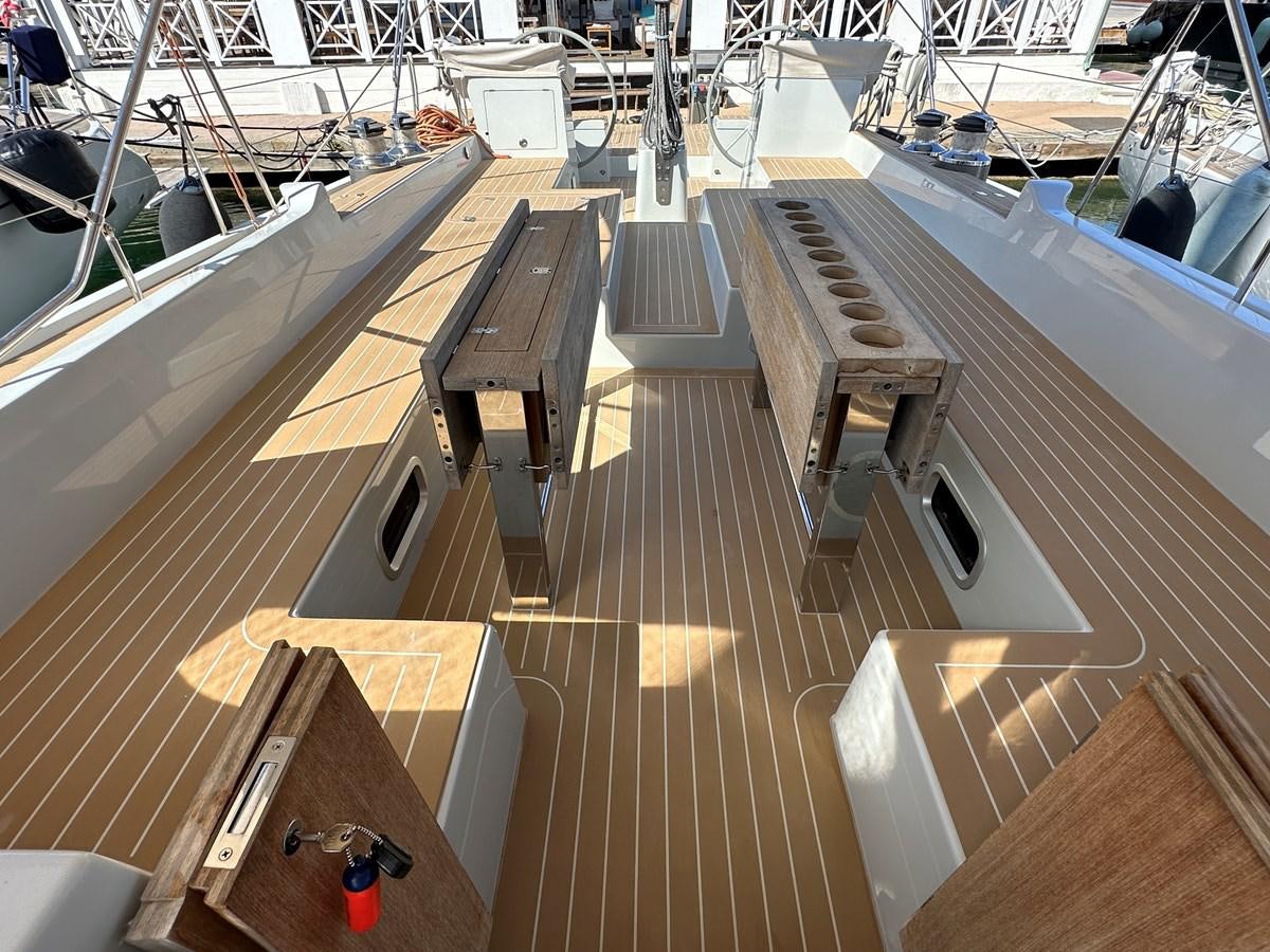 a room with a large wooden floor aboard REGINA Yacht for Sale
