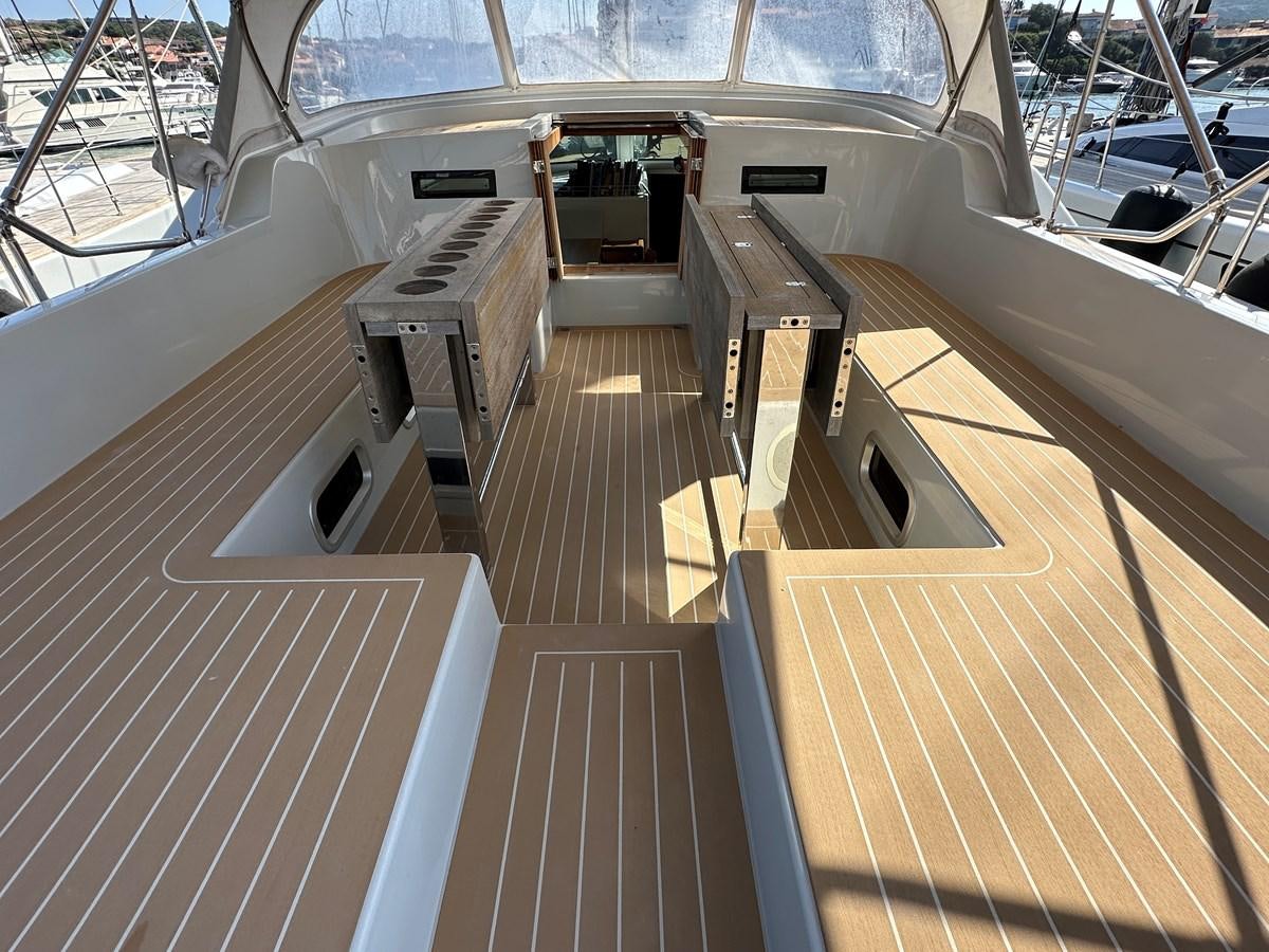 a room with a wood floor and a wood floor with a wood railing aboard REGINA Yacht for Sale