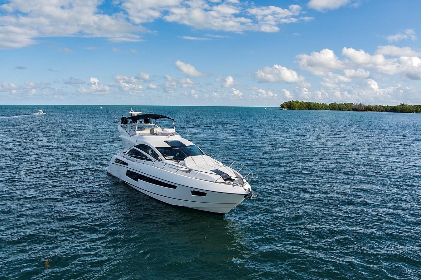 a white boat in the water aboard EL REY Yacht for Sale