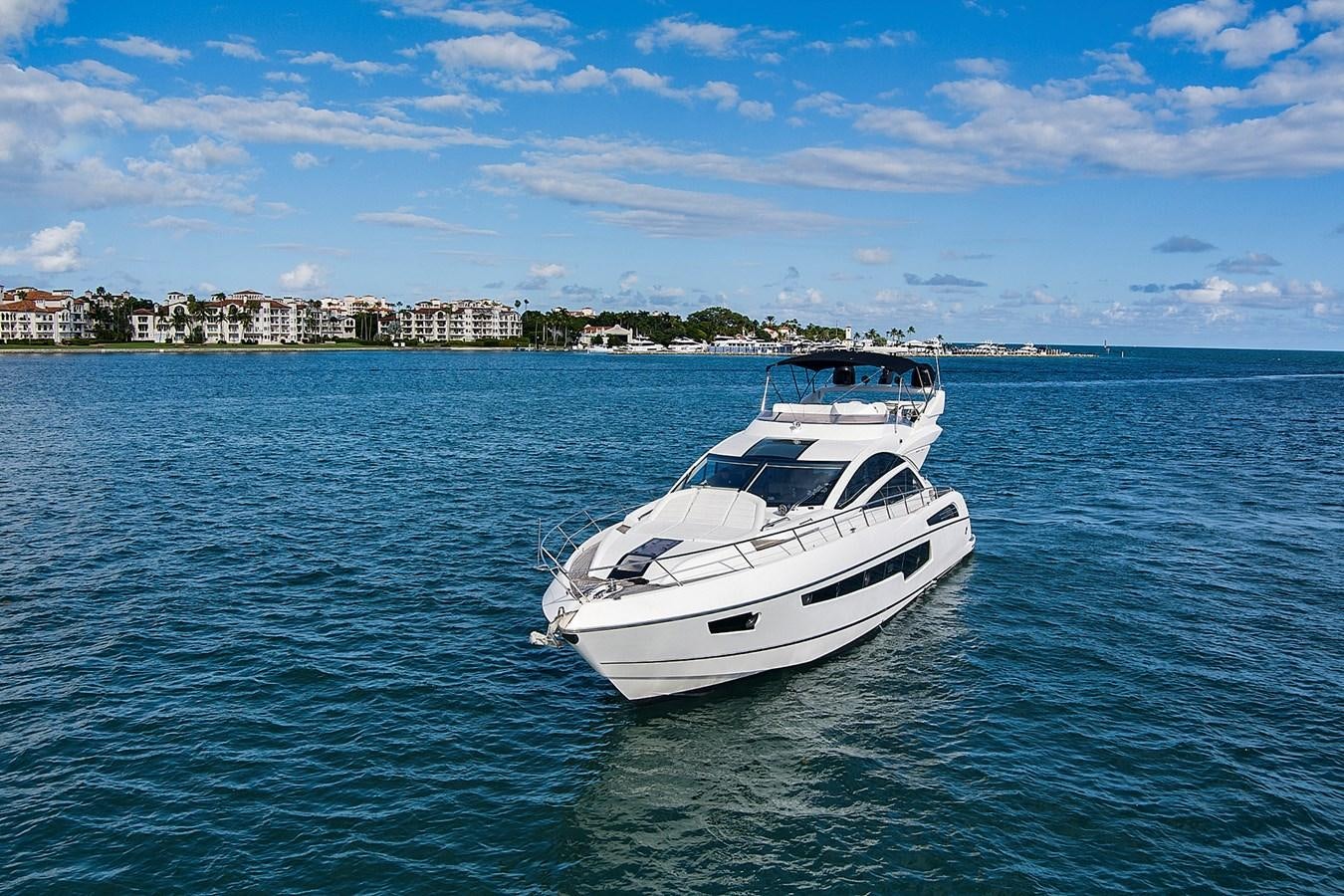 a white boat in the water aboard EL REY Yacht for Sale