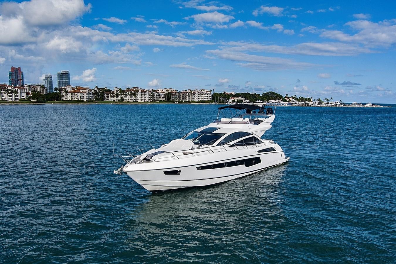 a white yacht in the water aboard EL REY Yacht for Sale