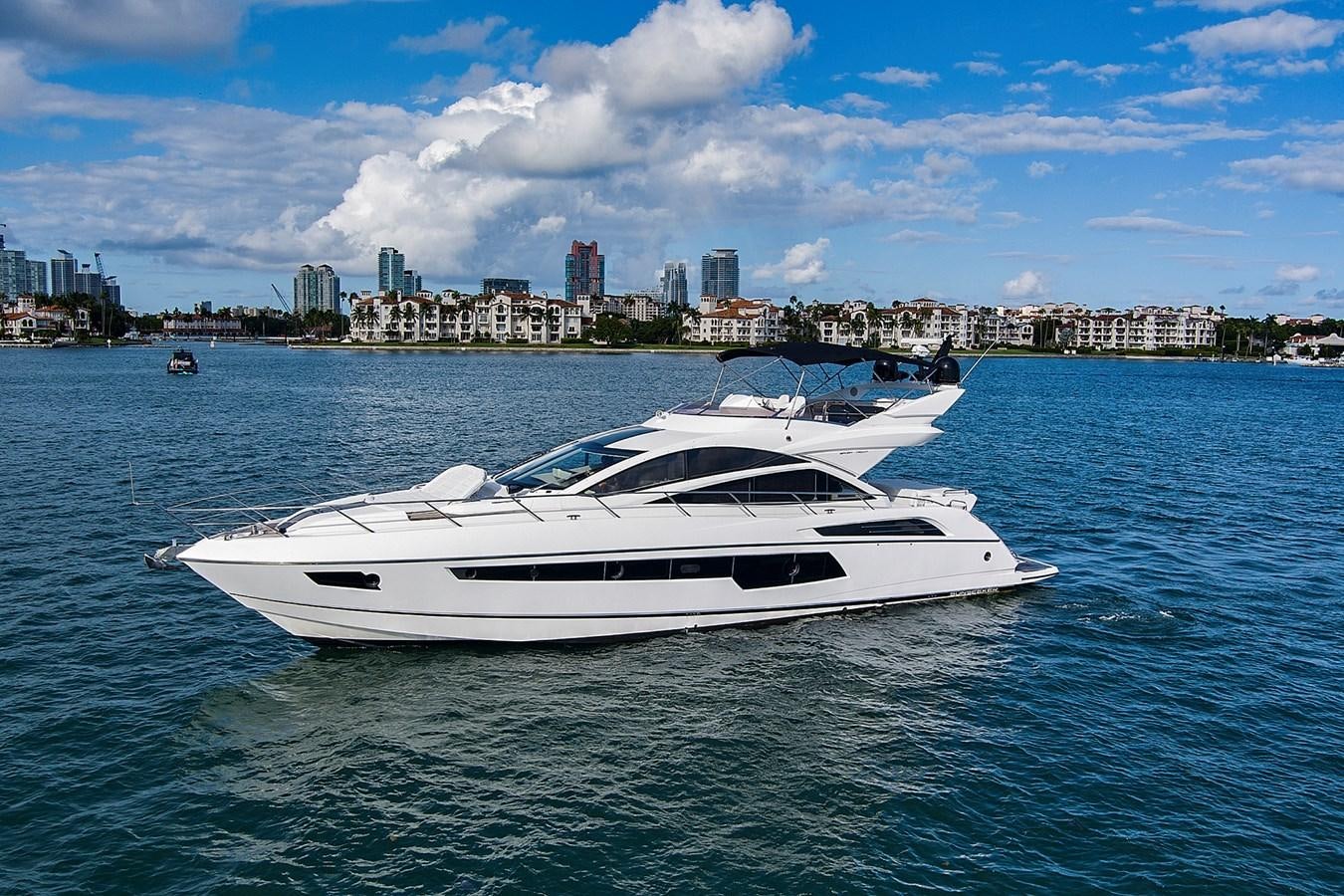 a white yacht in the water aboard EL REY Yacht for Sale