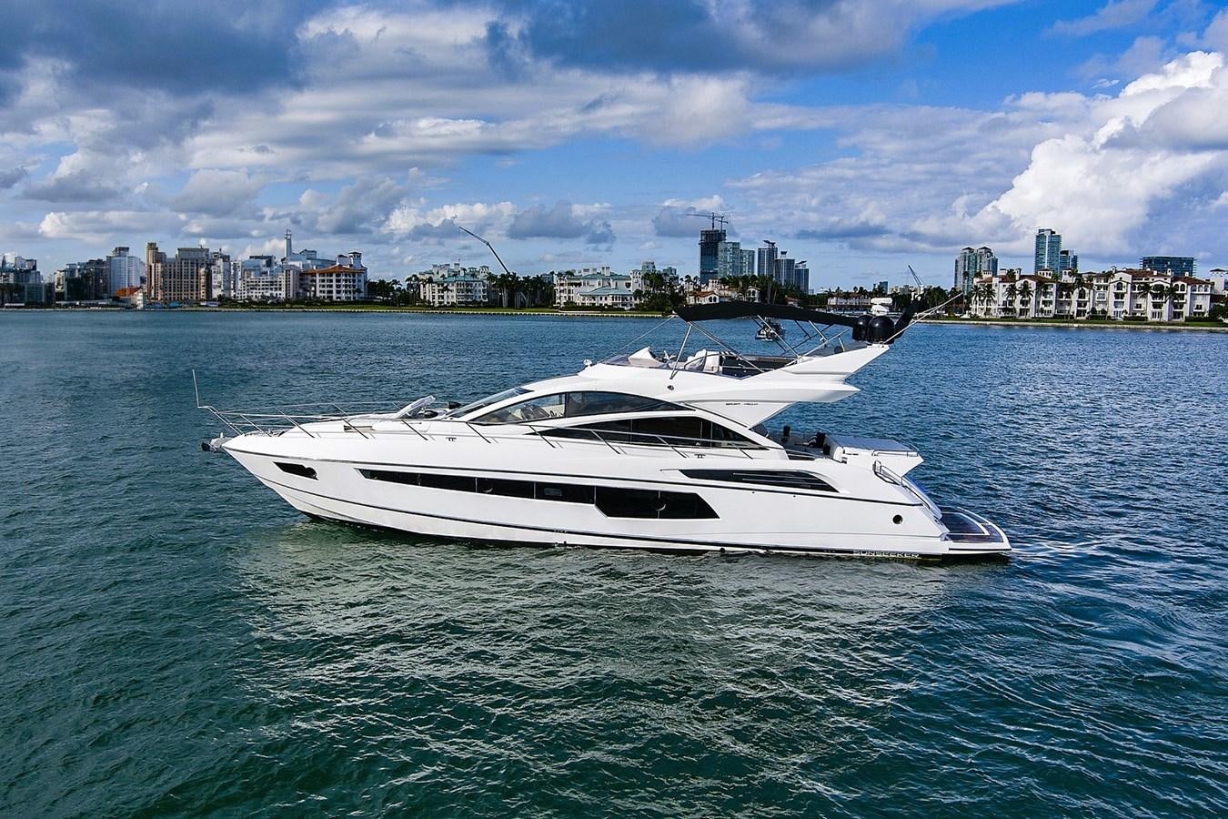 a white yacht in the water aboard EL REY Yacht for Sale