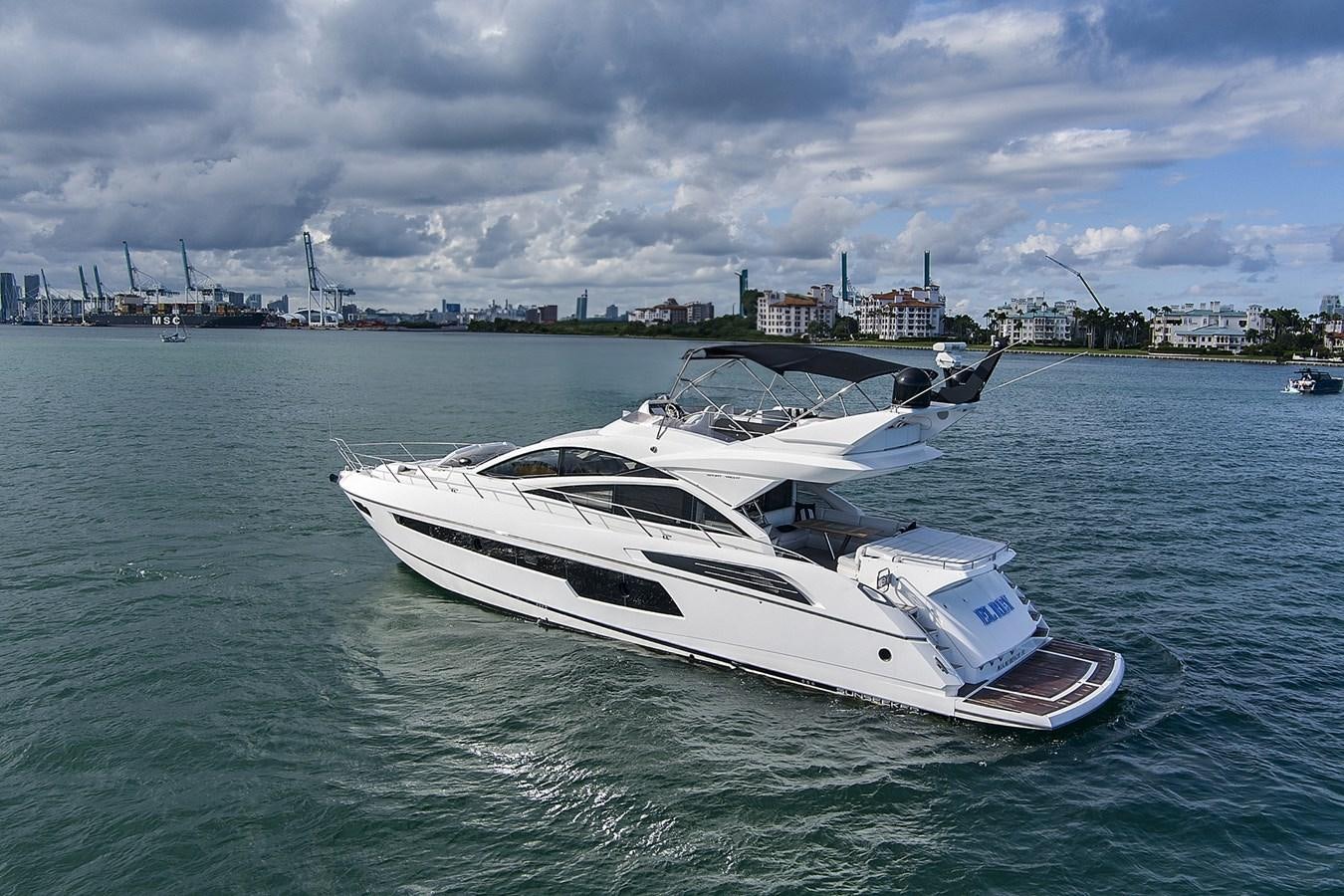 a white yacht in the water aboard EL REY Yacht for Sale