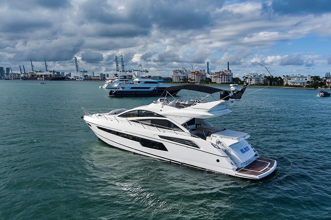 a white yacht in the water aboard EL REY Yacht for Sale