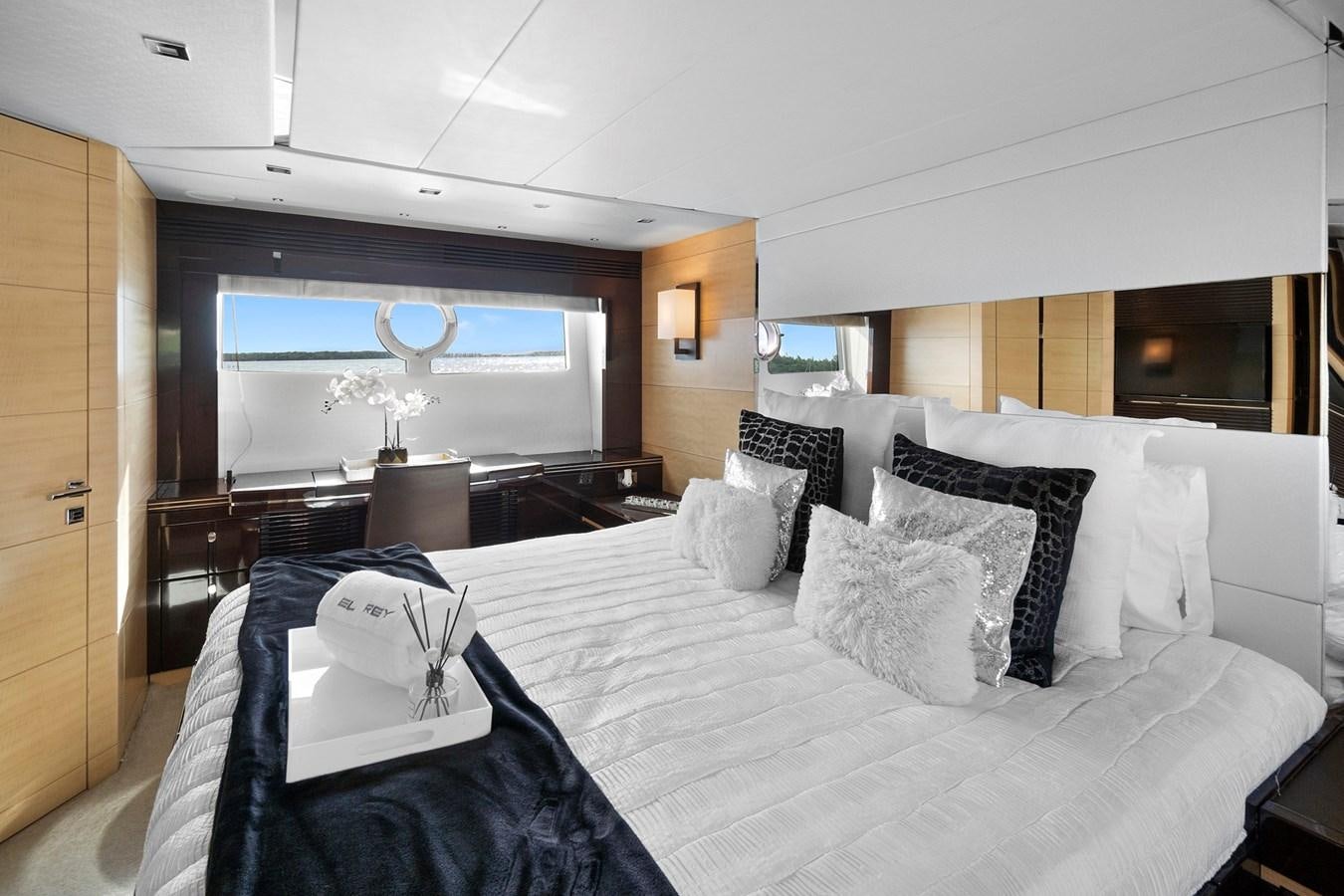 a large bed with pillows aboard EL REY Yacht for Sale
