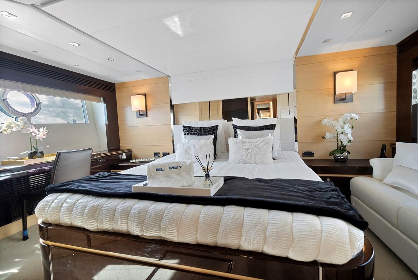 a large bed in a hotel room aboard EL REY Yacht for Sale