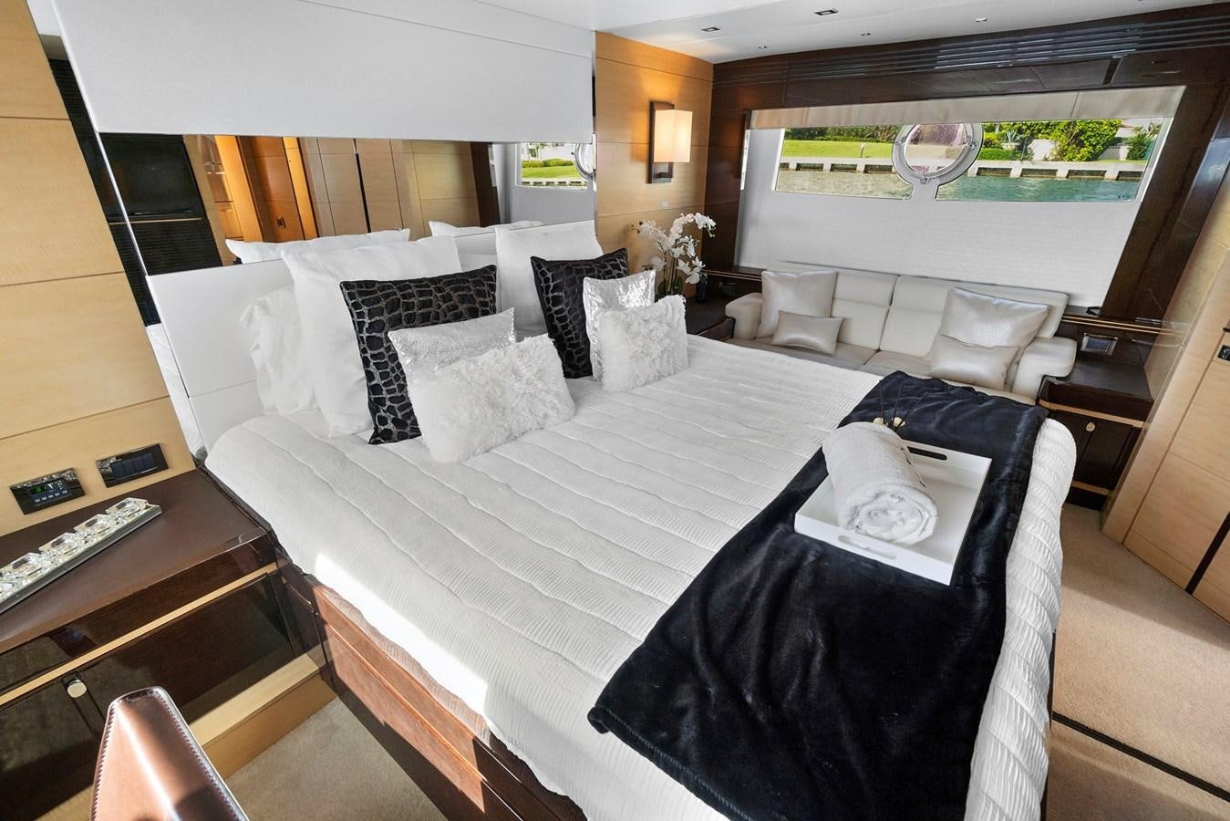 a large bed in a room aboard EL REY Yacht for Sale