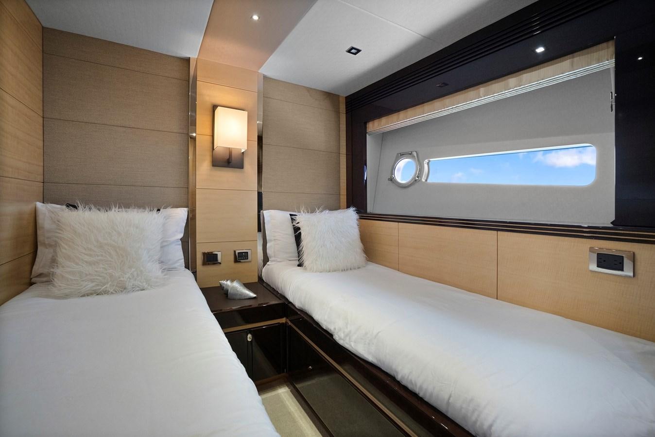 a room with two beds aboard EL REY Yacht for Sale