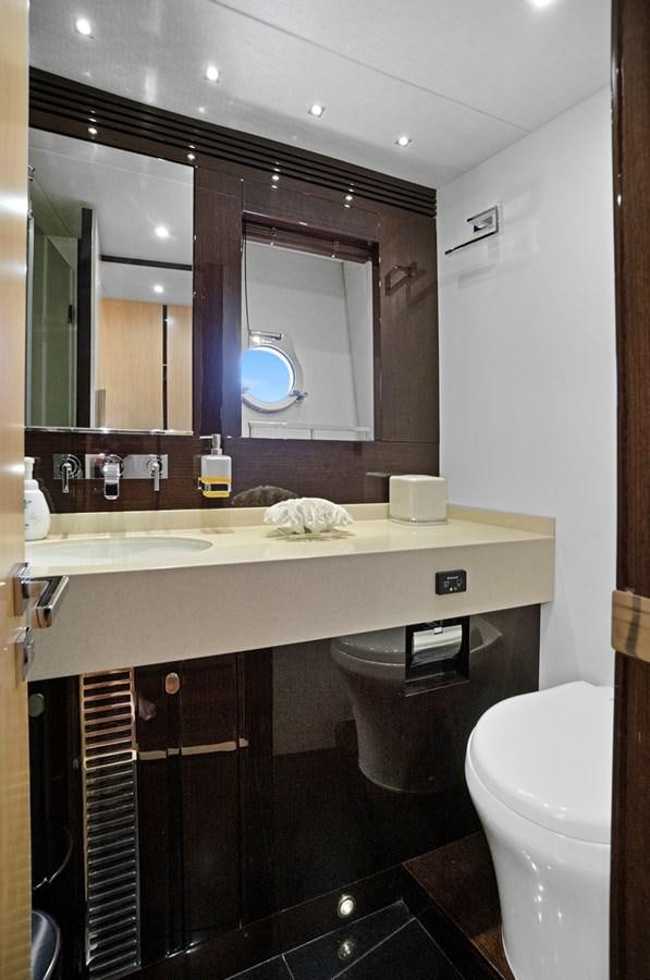 a bathroom with a sink and a toilet aboard EL REY Yacht for Sale