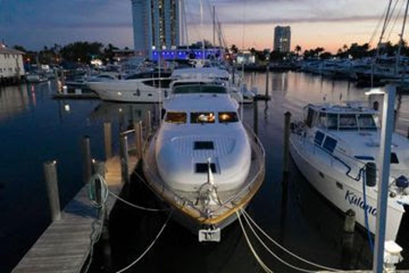 a group of boats docked aboard 1997 MAIORA FIPA 70' FLYBRIDGE Yacht for Sale