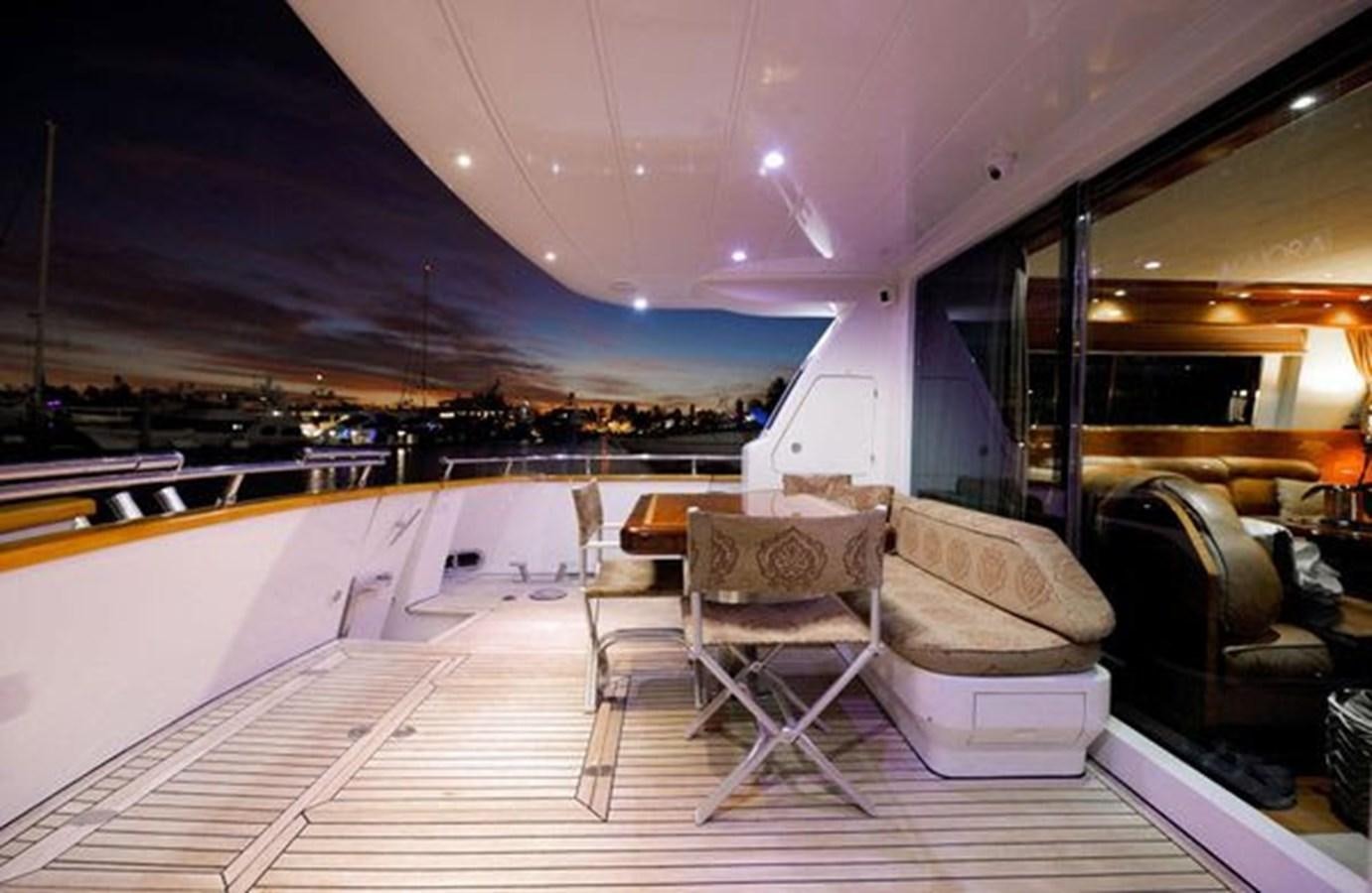 a boat on the water aboard 1997 MAIORA FIPA 70' FLYBRIDGE Yacht for Sale