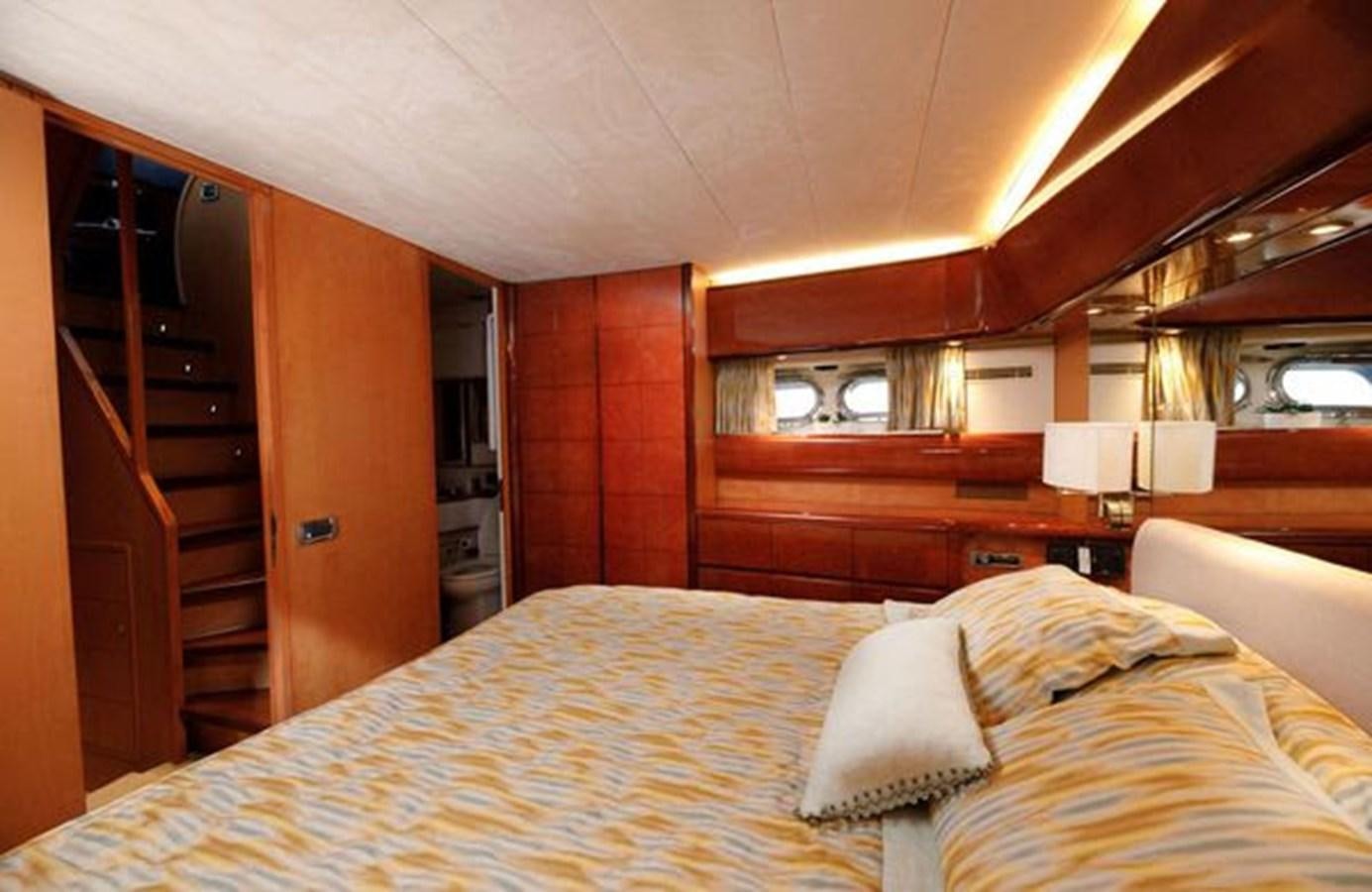 a bed in a cabin aboard 1997 MAIORA FIPA 70' FLYBRIDGE Yacht for Sale