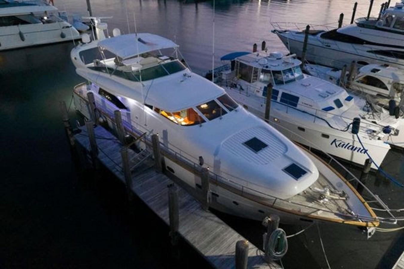 a group of boats docked aboard 1997 MAIORA FIPA 70' FLYBRIDGE Yacht for Sale