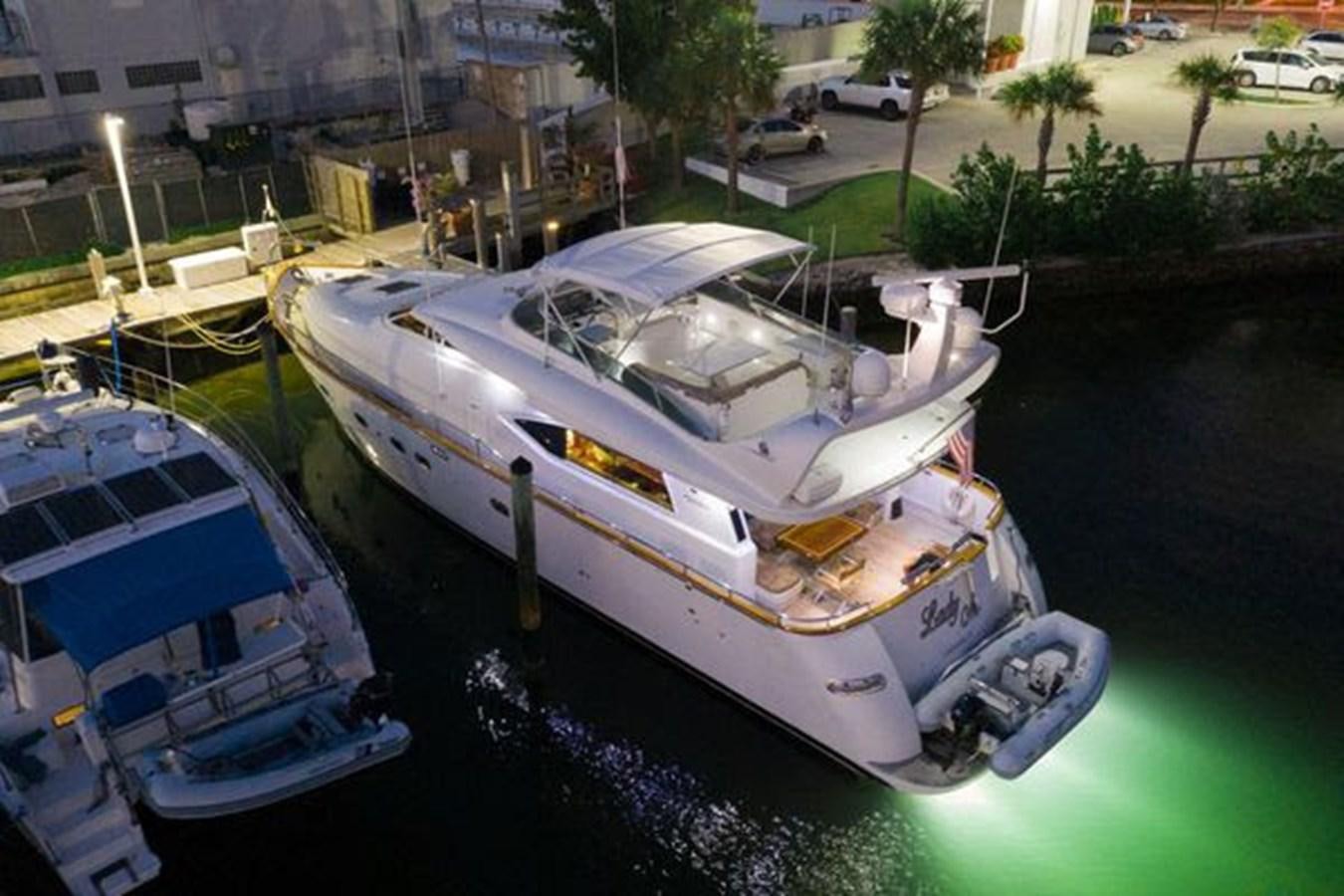 a group of boats docked aboard 1997 MAIORA FIPA 70' FLYBRIDGE Yacht for Sale
