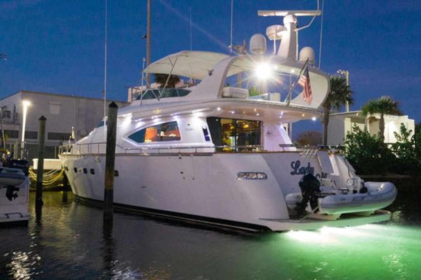 a boat on the water aboard 1997 MAIORA FIPA 70' FLYBRIDGE Yacht for Sale