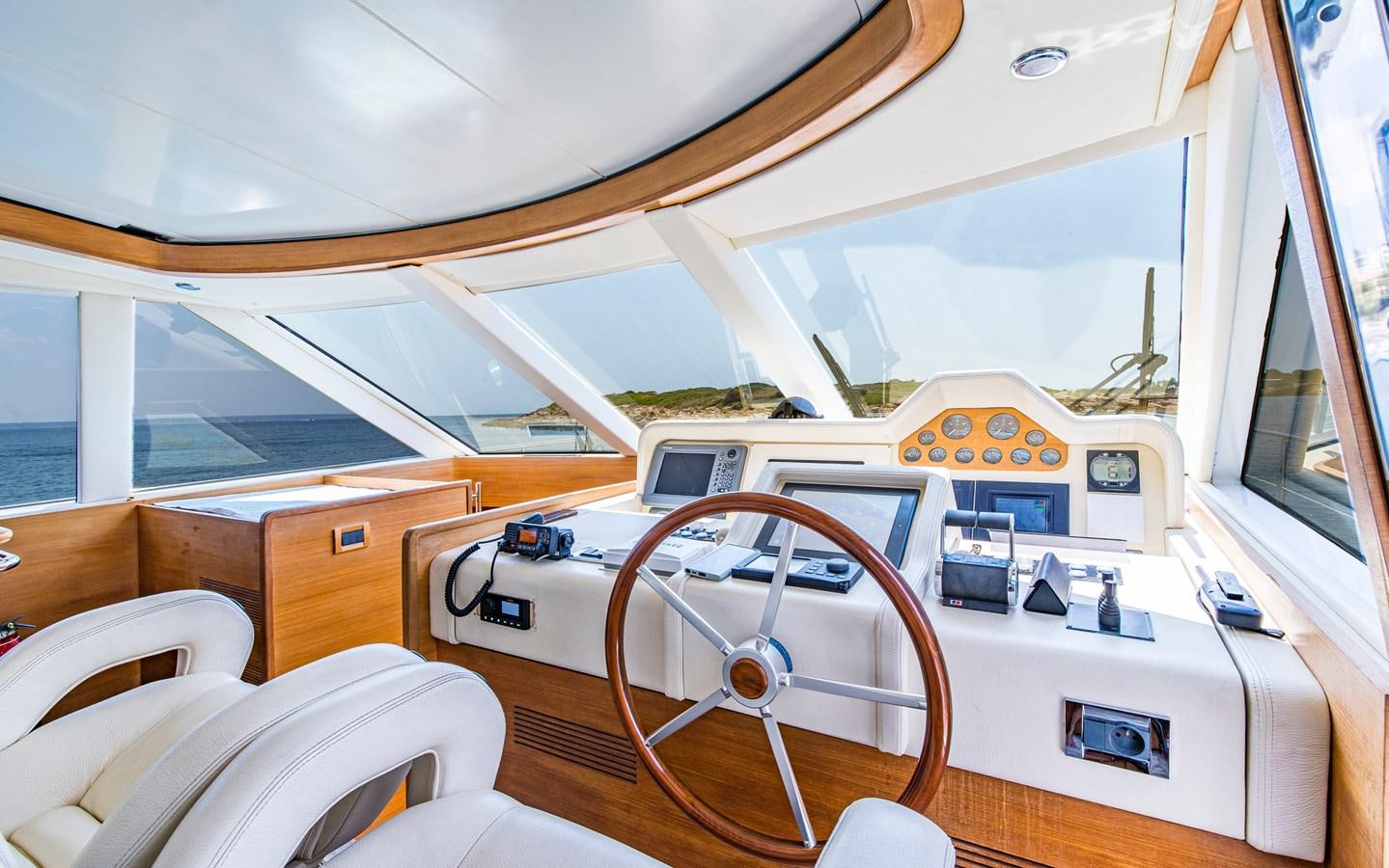 inside of a white car aboard PARODIA Yacht for Sale