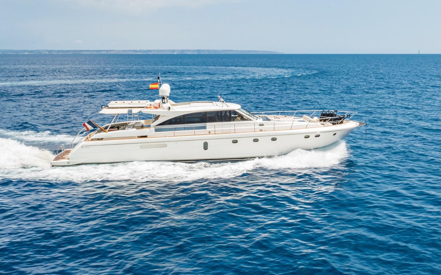 a white yacht in the water aboard PARODIA Yacht for Sale