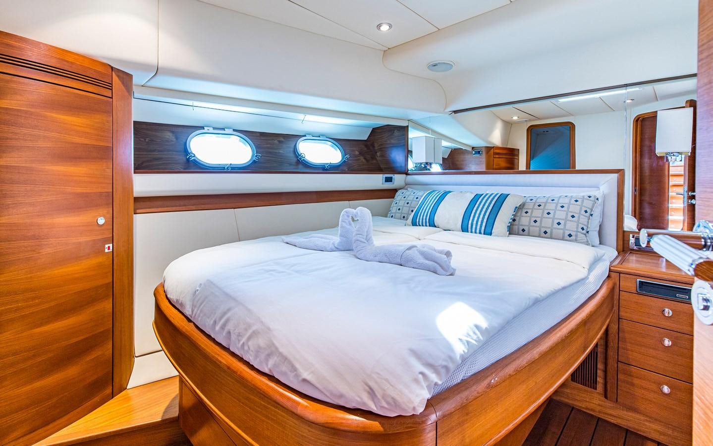 a couple of beds in a room aboard PARODIA Yacht for Sale