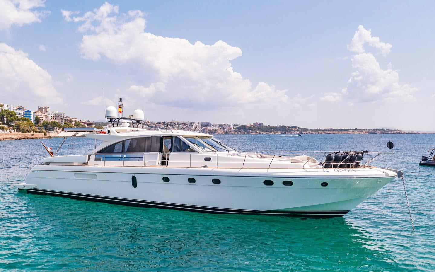 a white boat in the water aboard PARODIA Yacht for Sale