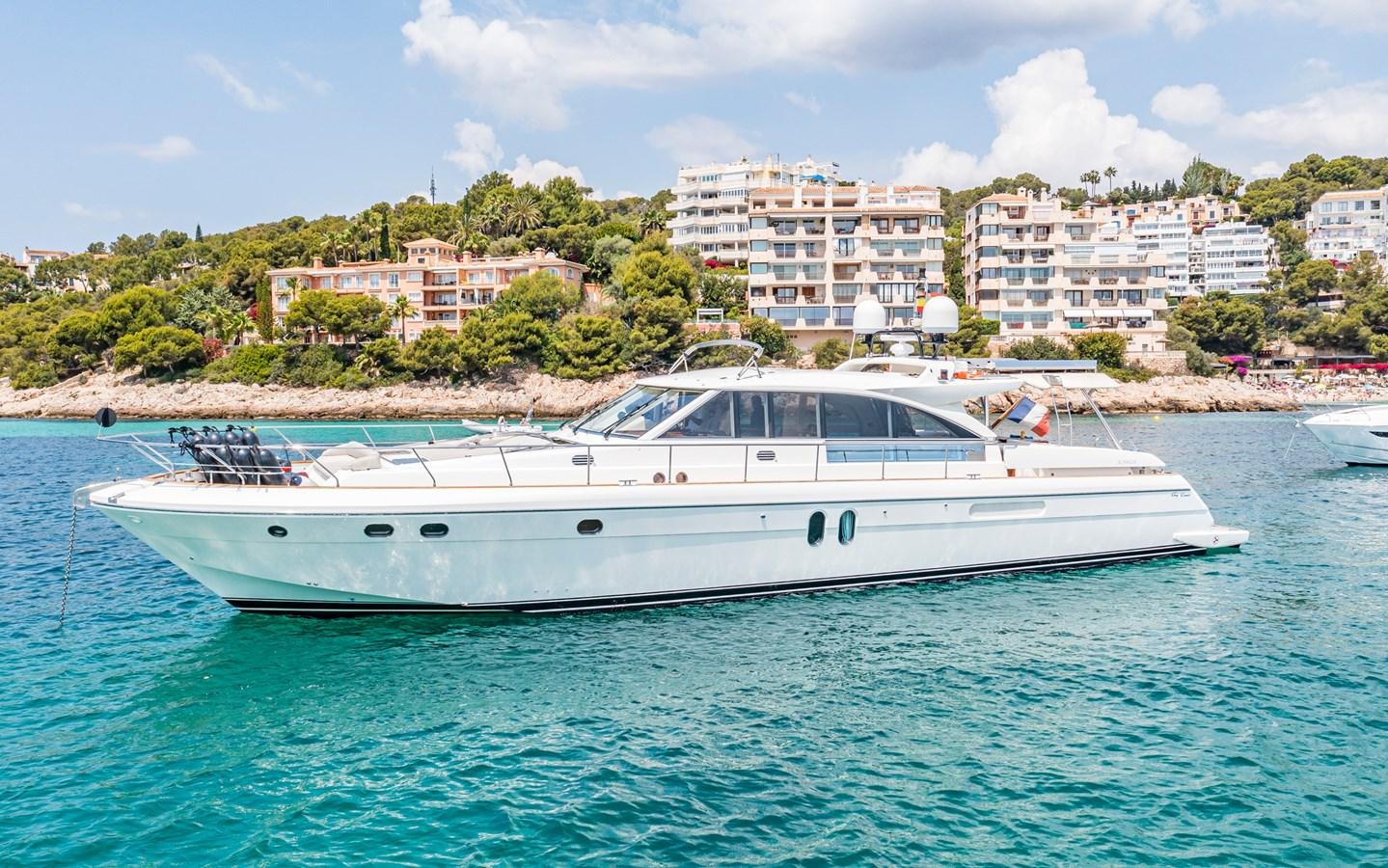 a white boat in the water aboard PARODIA Yacht for Sale