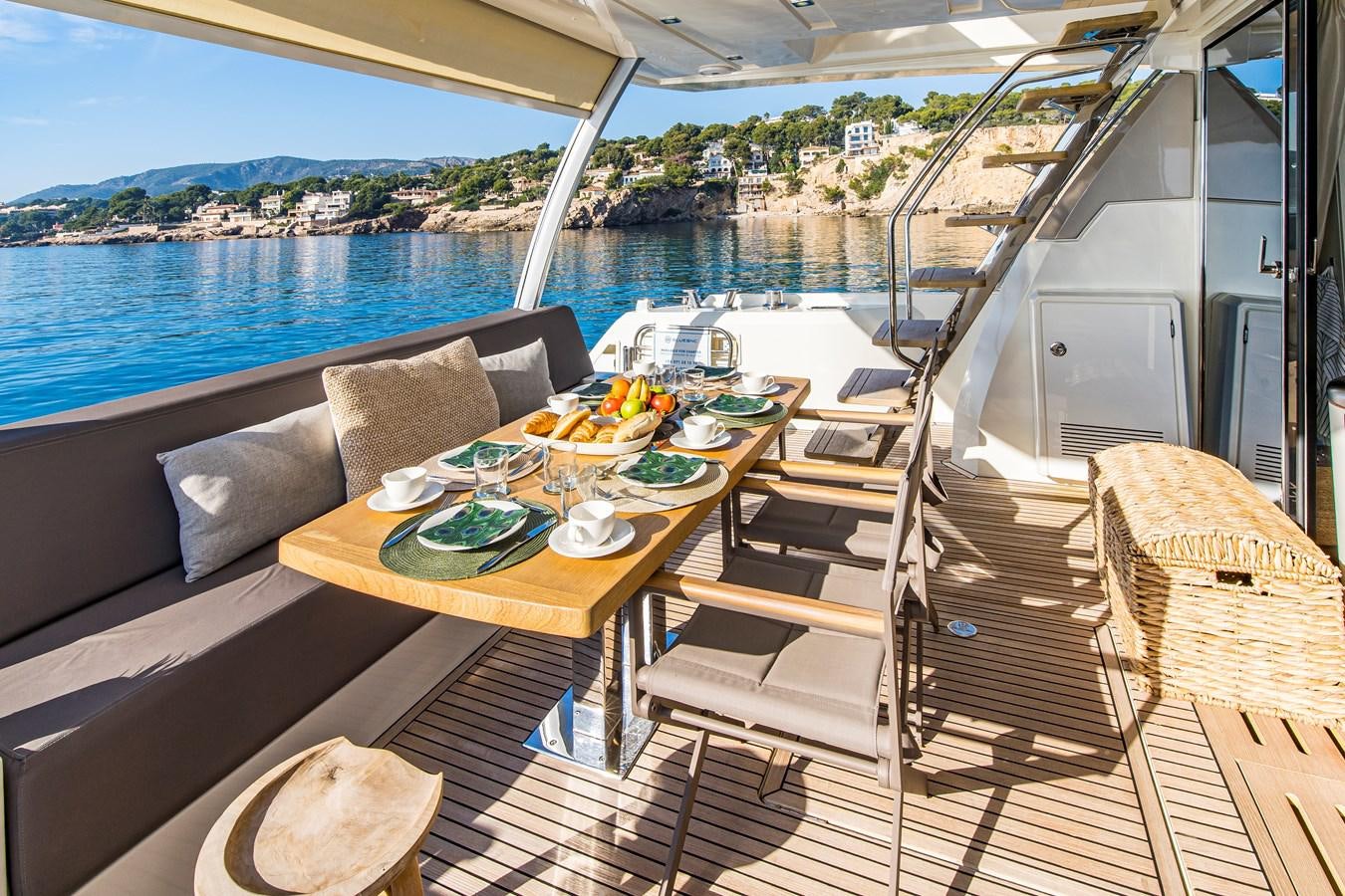 a table on a boat aboard BLUE M Yacht for Sale
