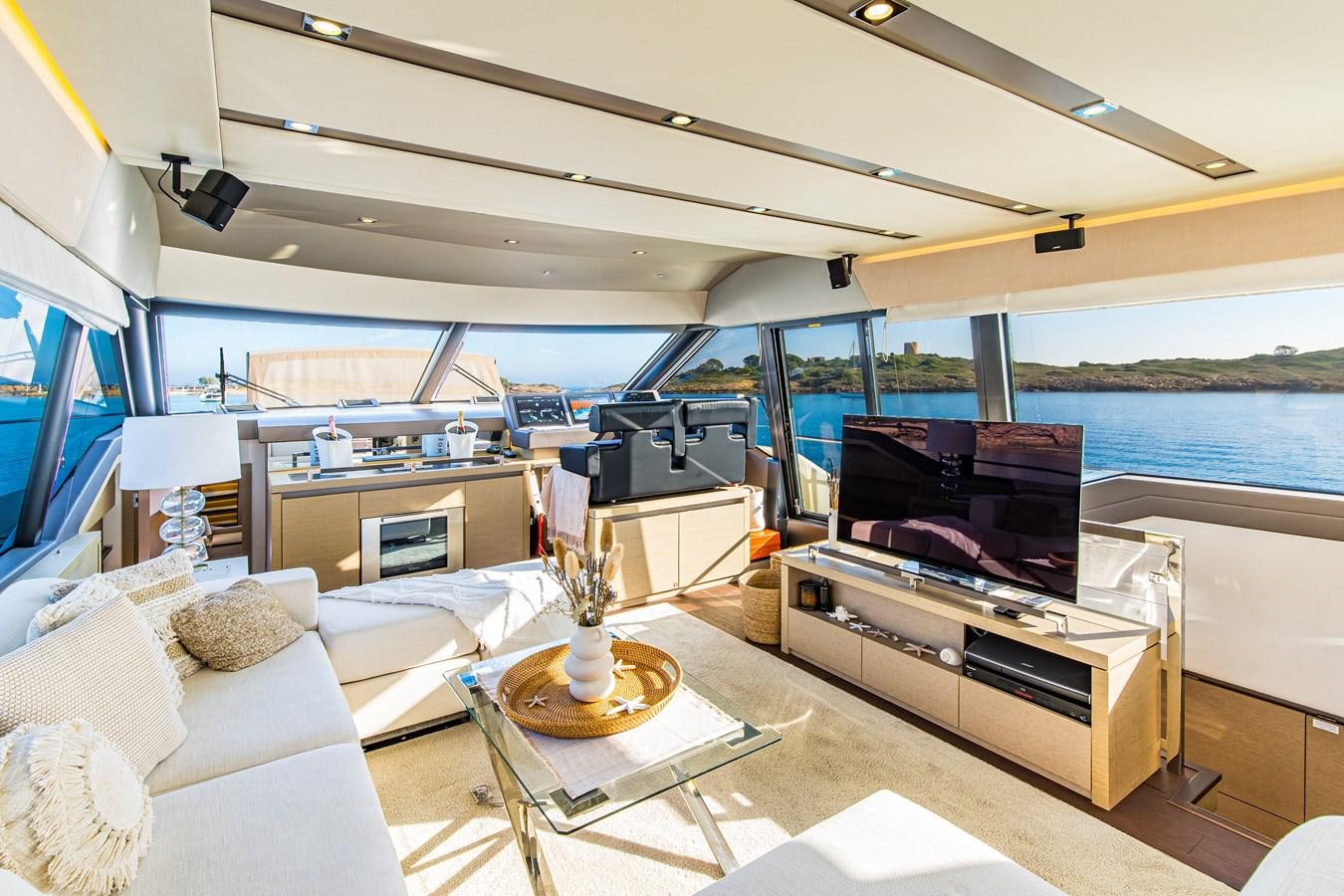 a living room with a large window aboard BLUE M Yacht for Sale