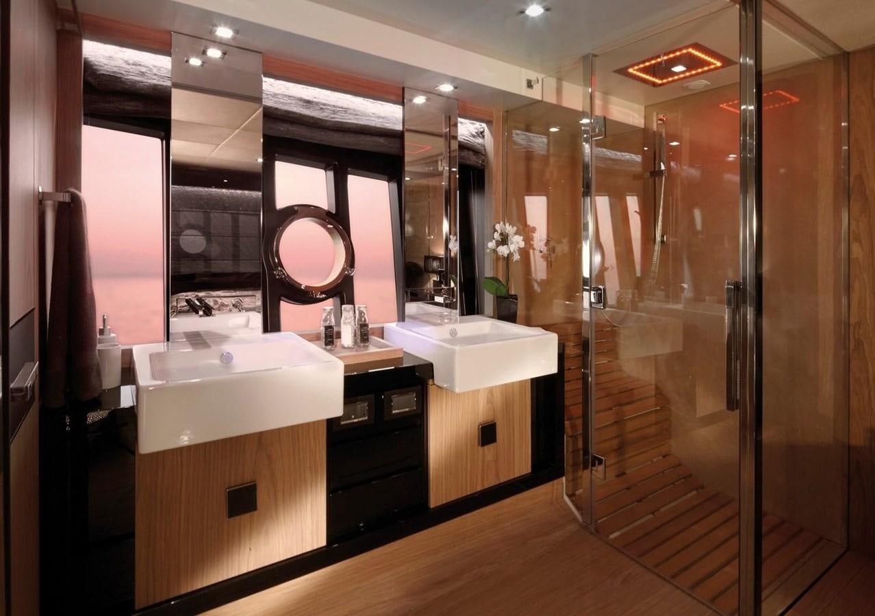 a bathroom with a large mirror aboard SESSA MARINE C68 Yacht for Sale