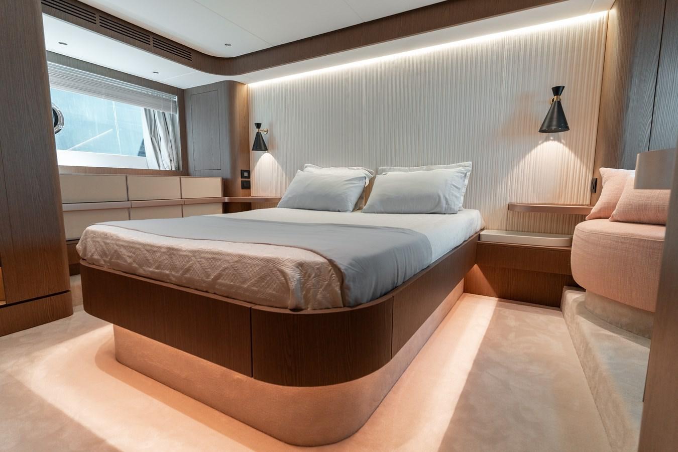 a bed in a room aboard INIZIA Yacht for Sale