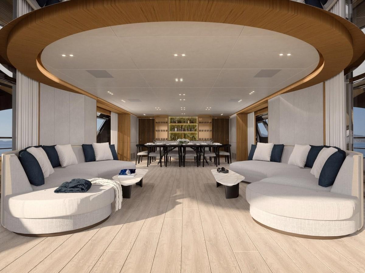 a large living room with a wood ceiling aboard COSMICO Yacht for Sale