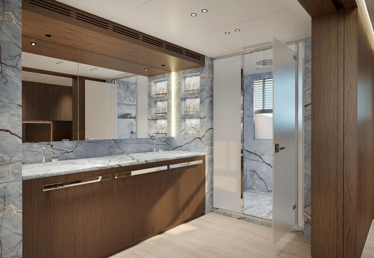 a bathroom with a large mirror aboard COSMICO Yacht for Sale