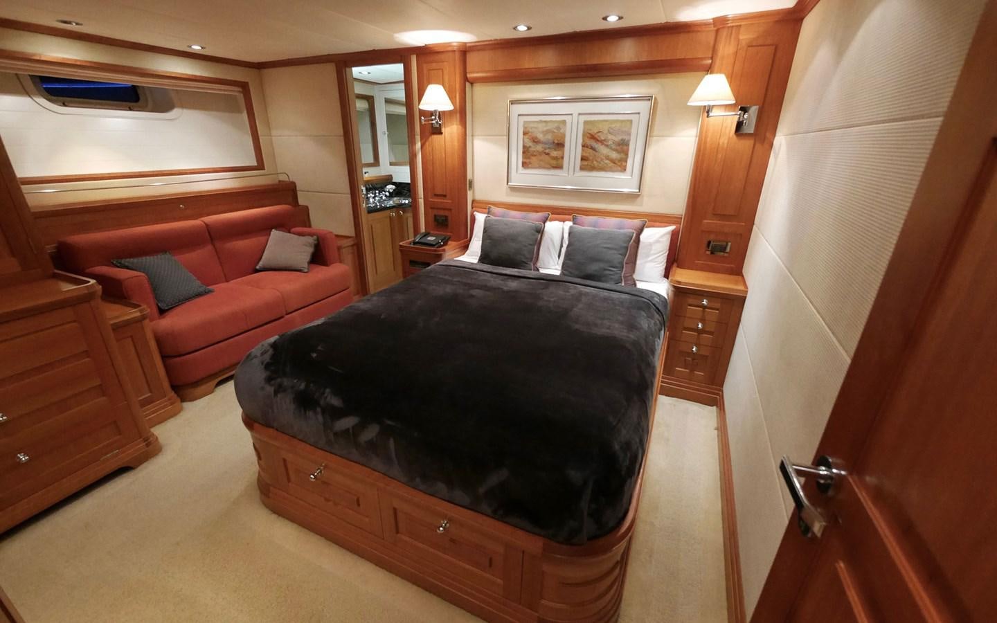 a bed in a room aboard KOKOTEA Yacht for Sale