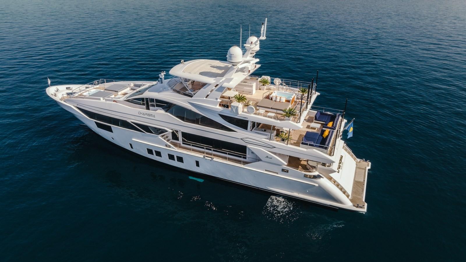 a large white ship in the water aboard CHARISMA Yacht for Sale