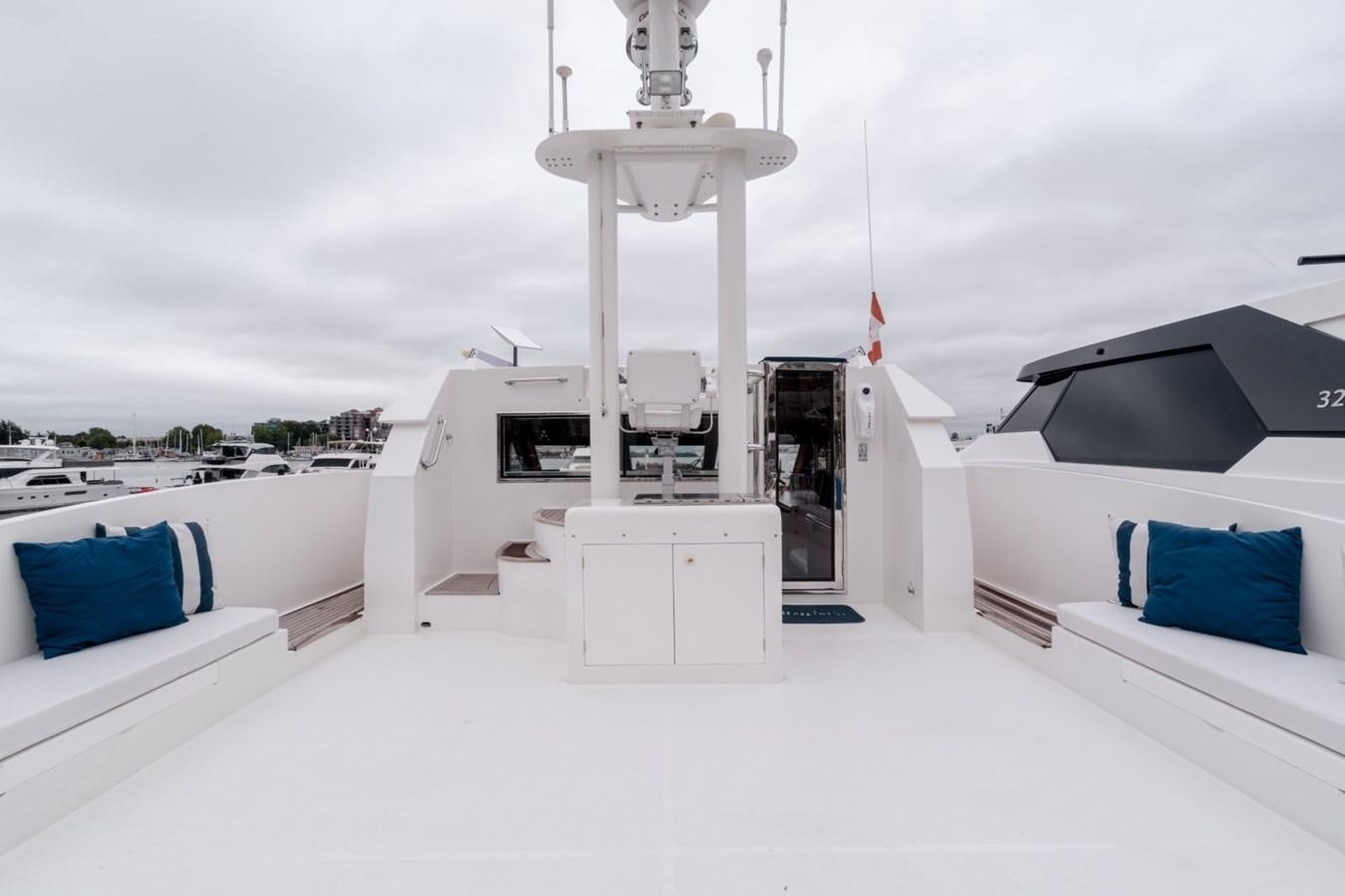 a white building with a tower aboard HAPPINESS II Yacht for Sale