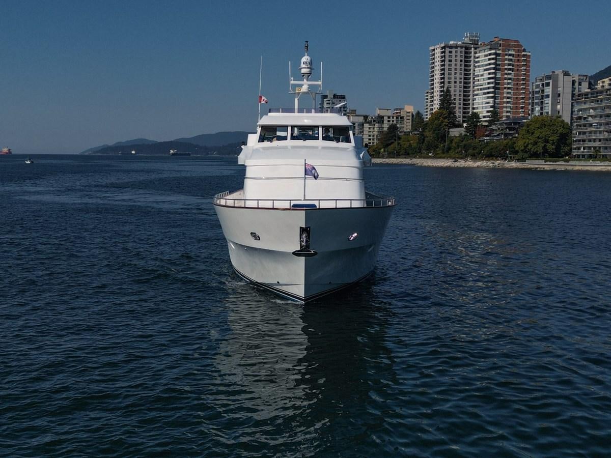 a boat on the water aboard HAPPINESS II Yacht for Sale