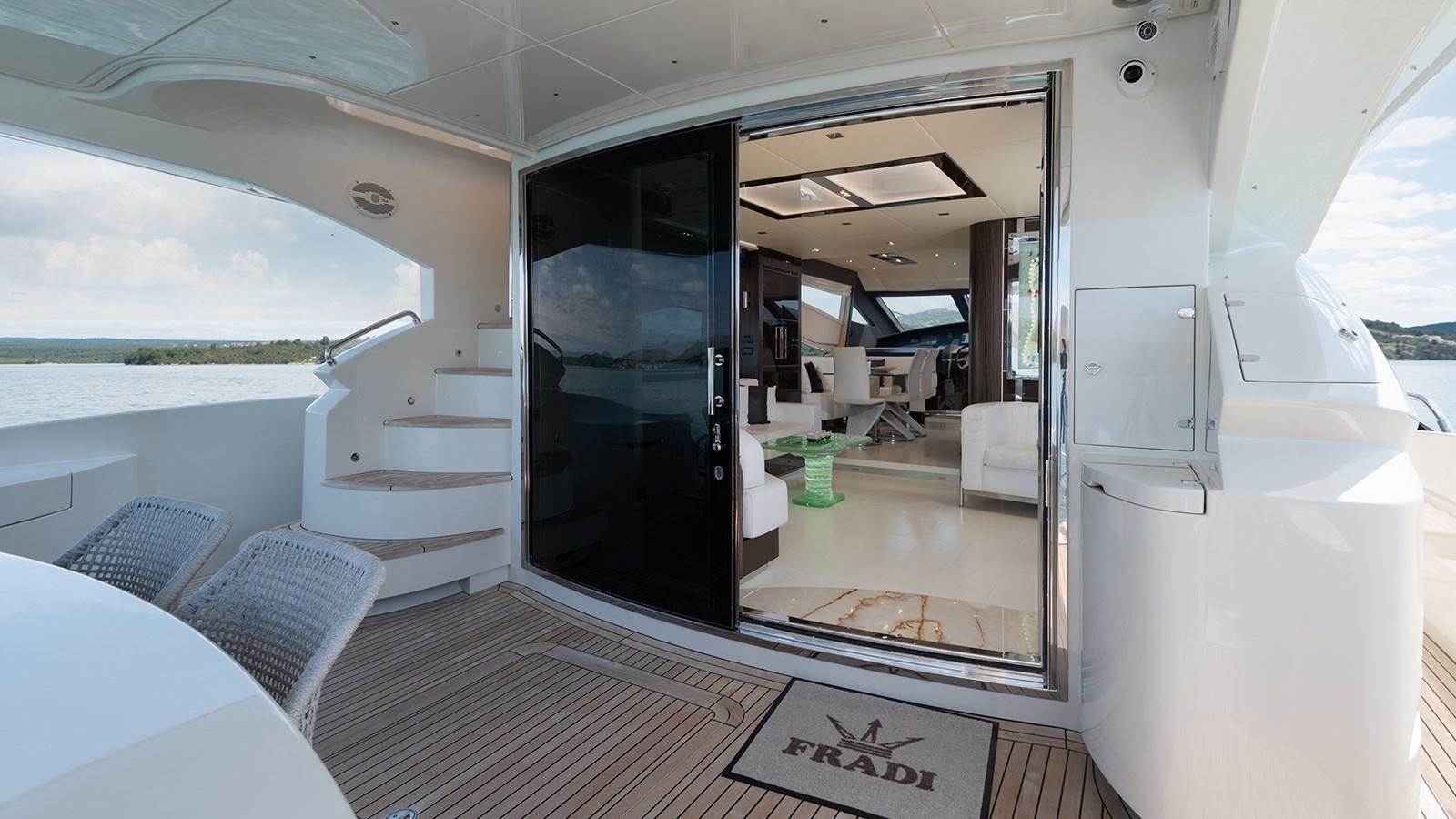 a room with a sliding door aboard FRADI Yacht for Sale
