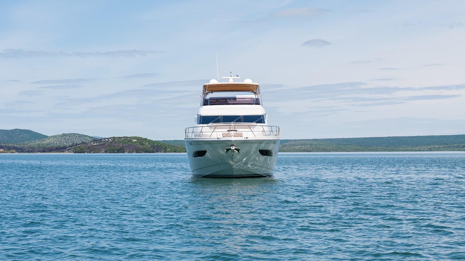a white boat in the water aboard FRADI Yacht for Sale