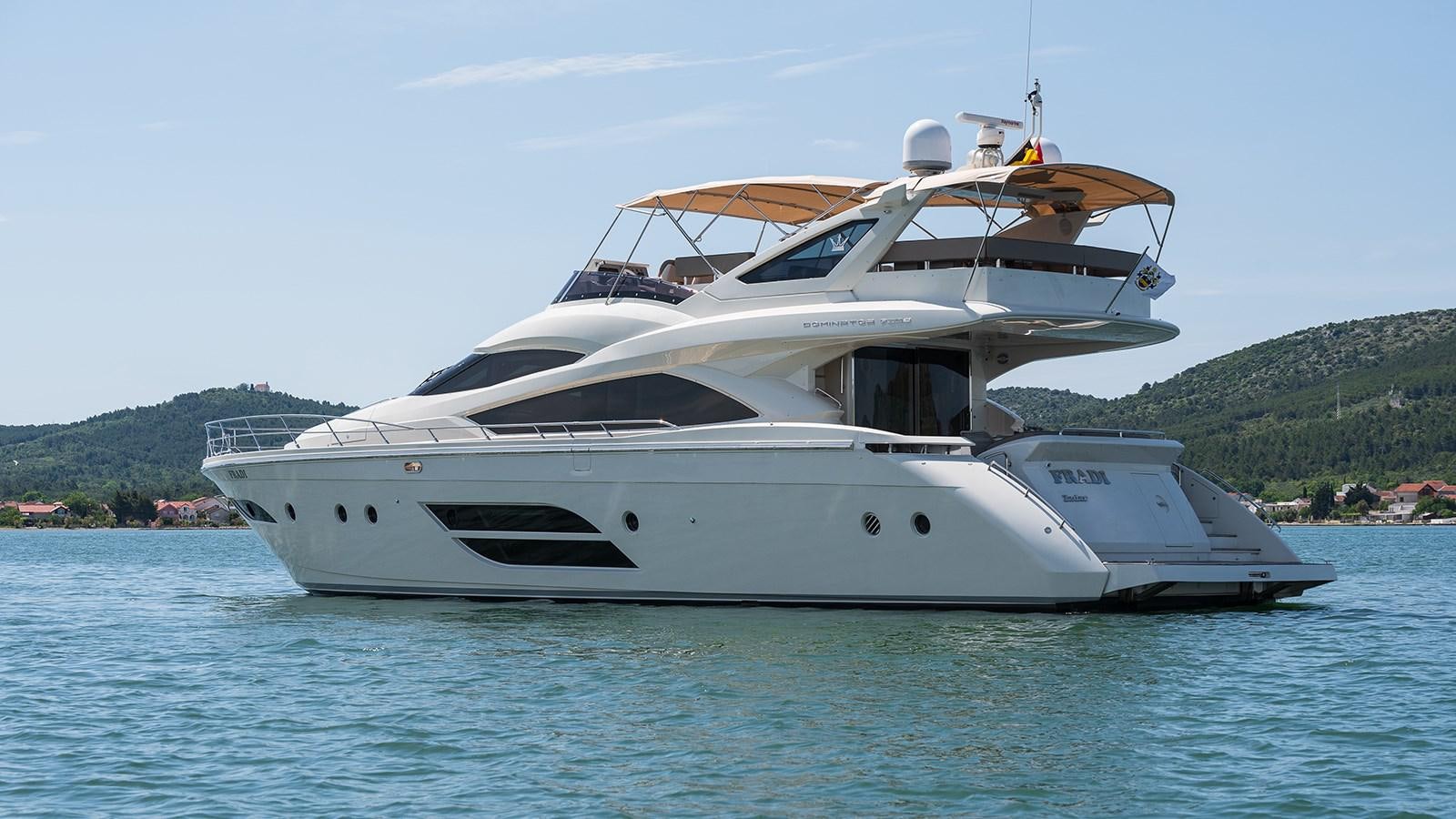 a white yacht on the water aboard FRADI Yacht for Sale