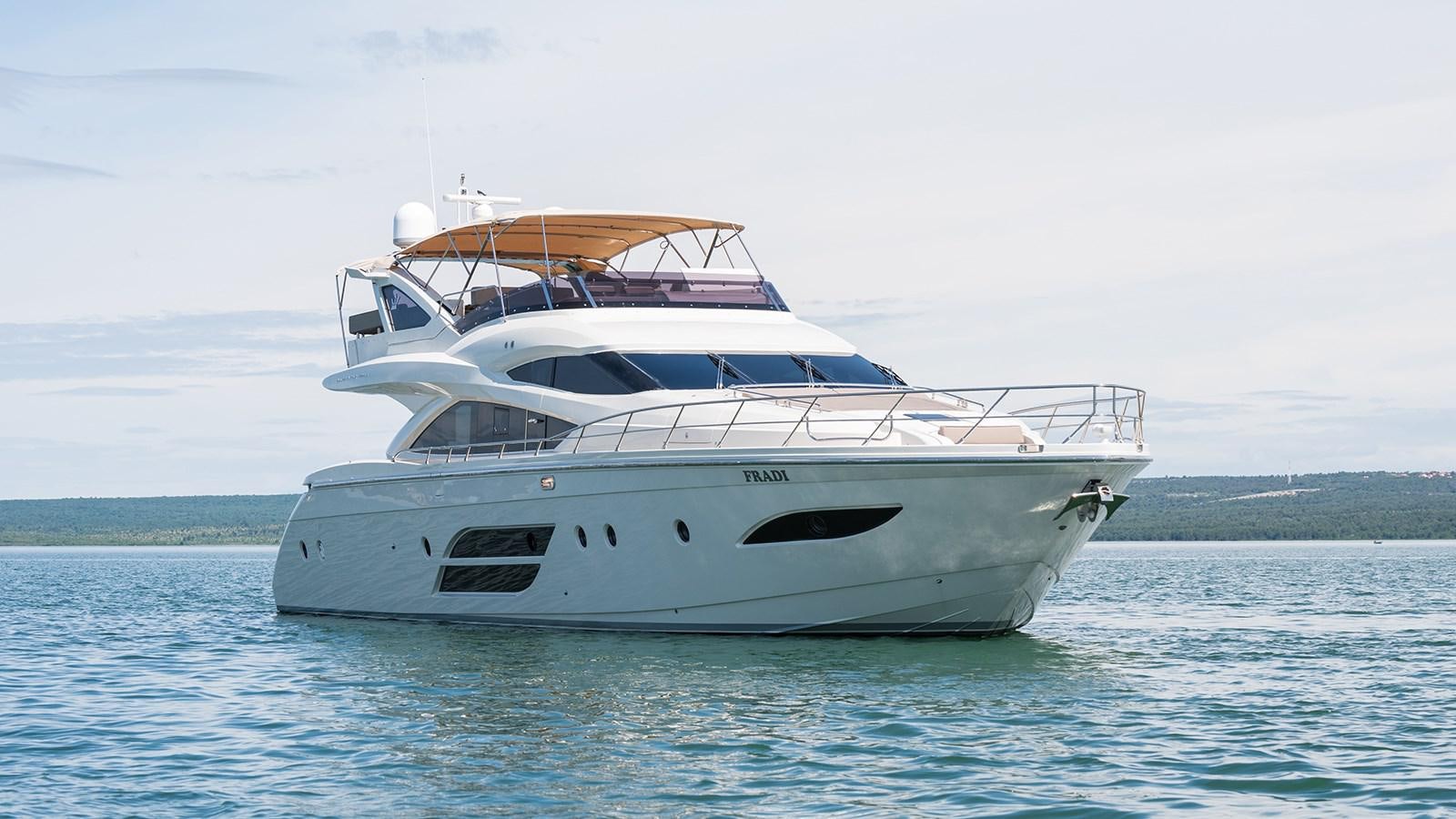 a white yacht in the water aboard FRADI Yacht for Sale